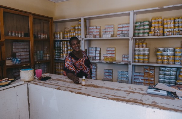 Women selling oil at her shop 